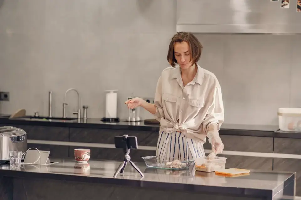 Dog owner preparing a meal