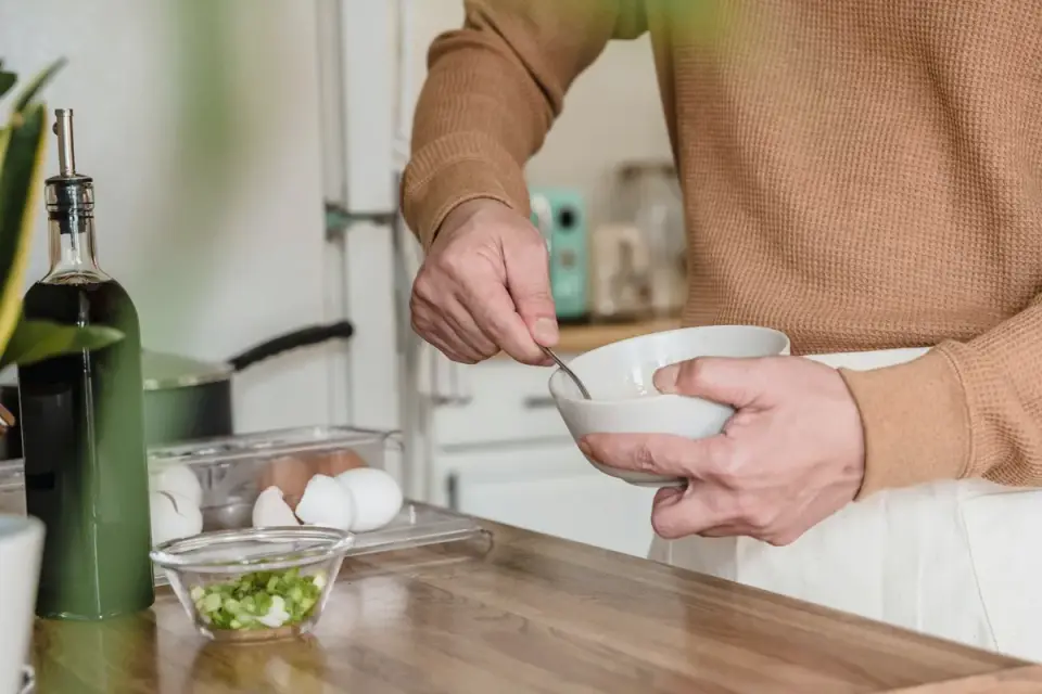 Dog owner preparing a meal